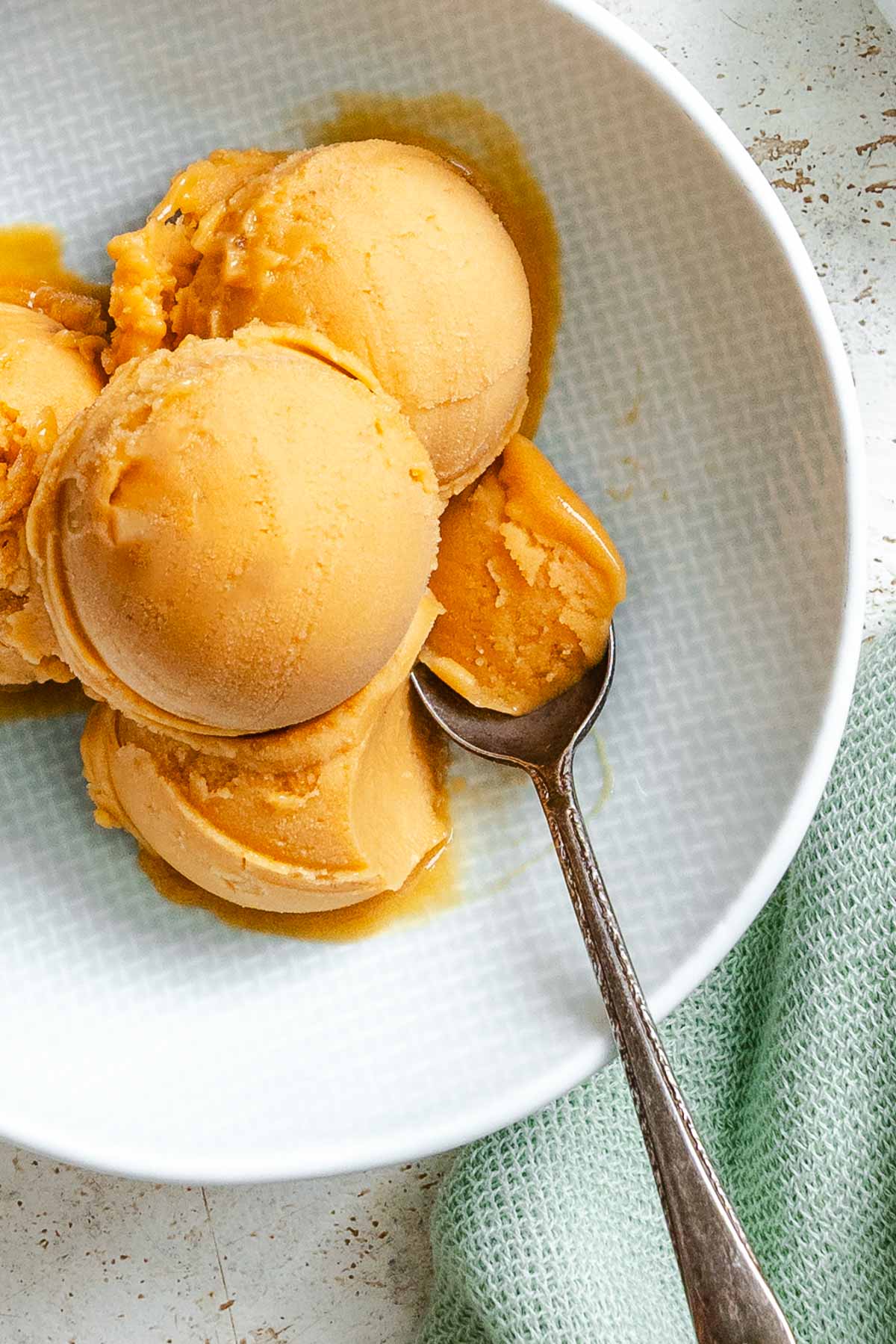 Completed Ninja Creami Peach Sorbet (Fresh or Canned) in a bowl.