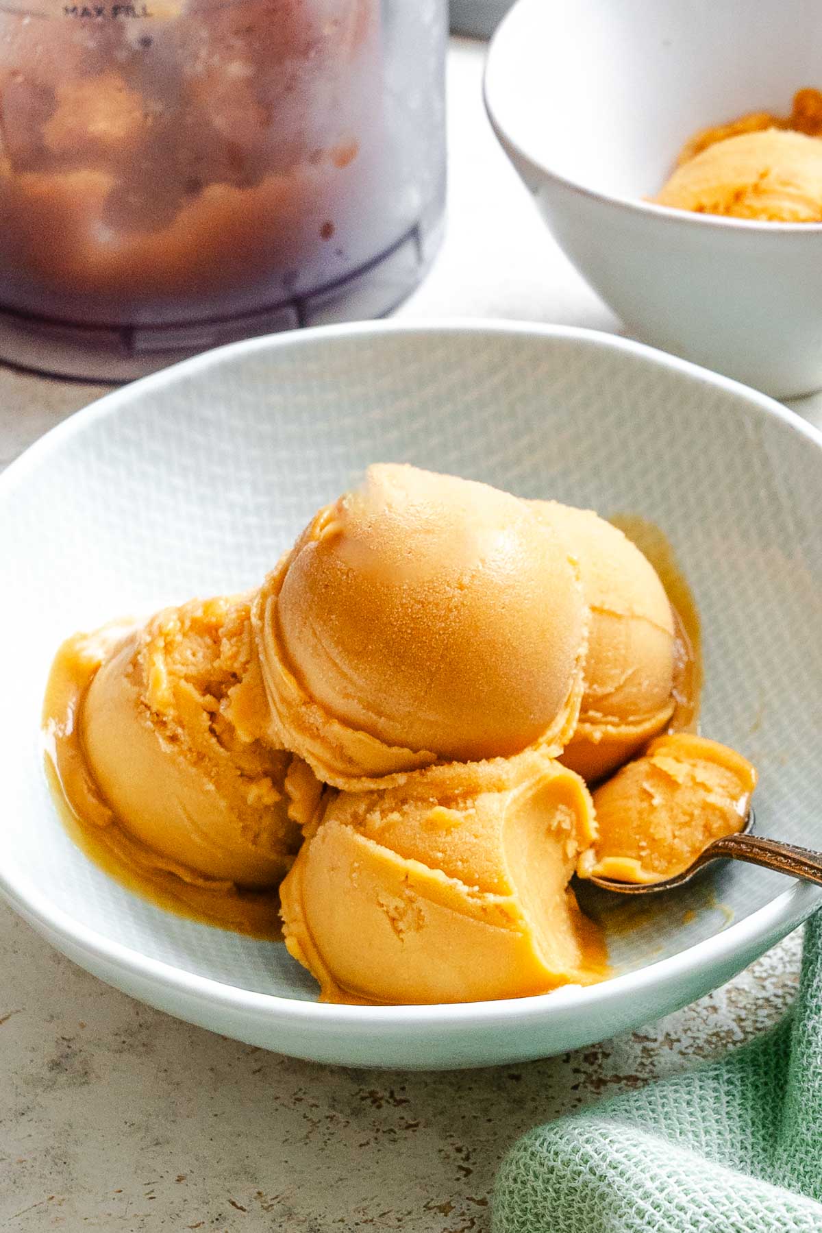 Completed Ninja Creami Peach Sorbet (Fresh or Canned) in a bowl.