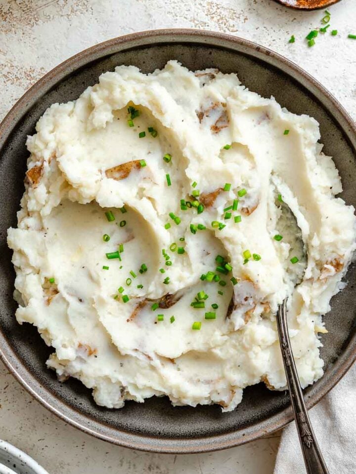 Completed vegan garlic mashed potatoes in a bowl.