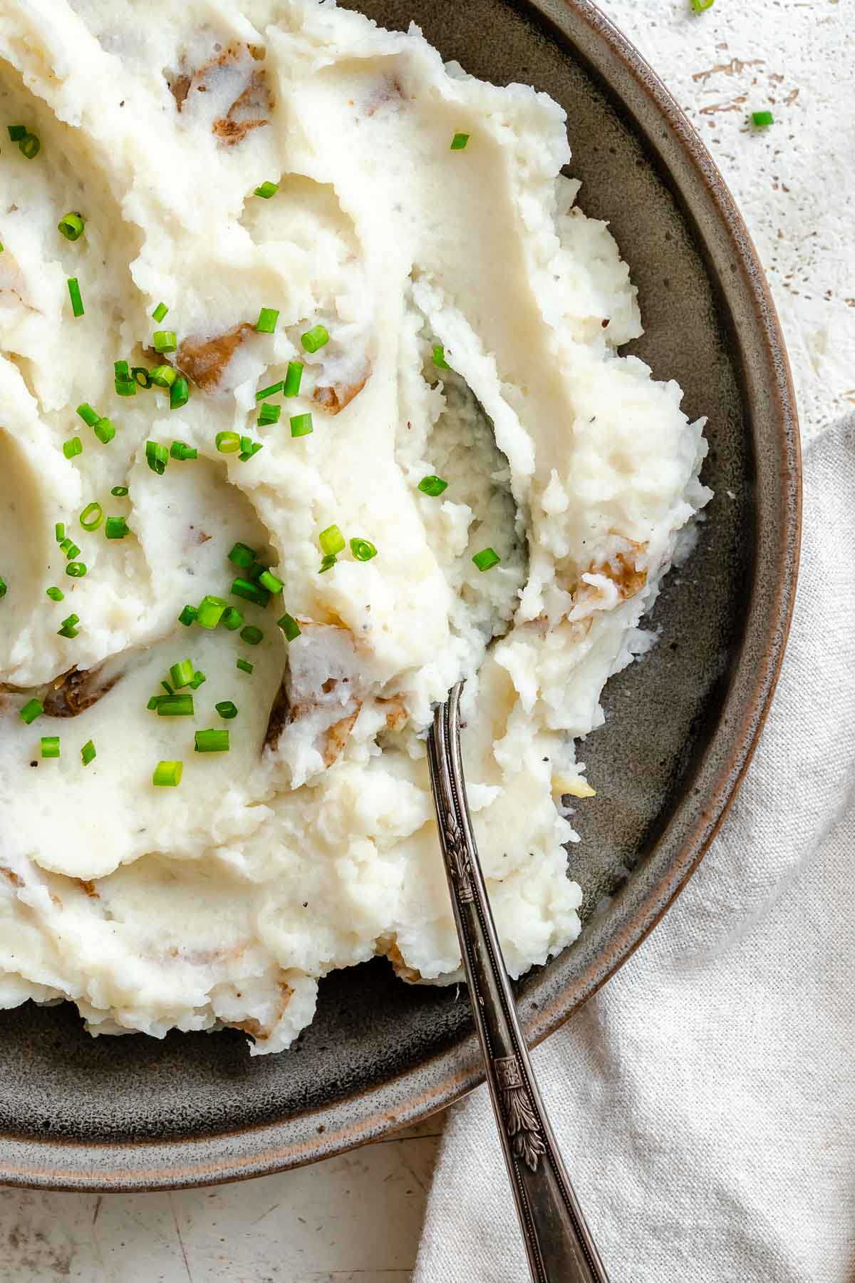 Completed vegan garlic mashed potatoes in a bowl.