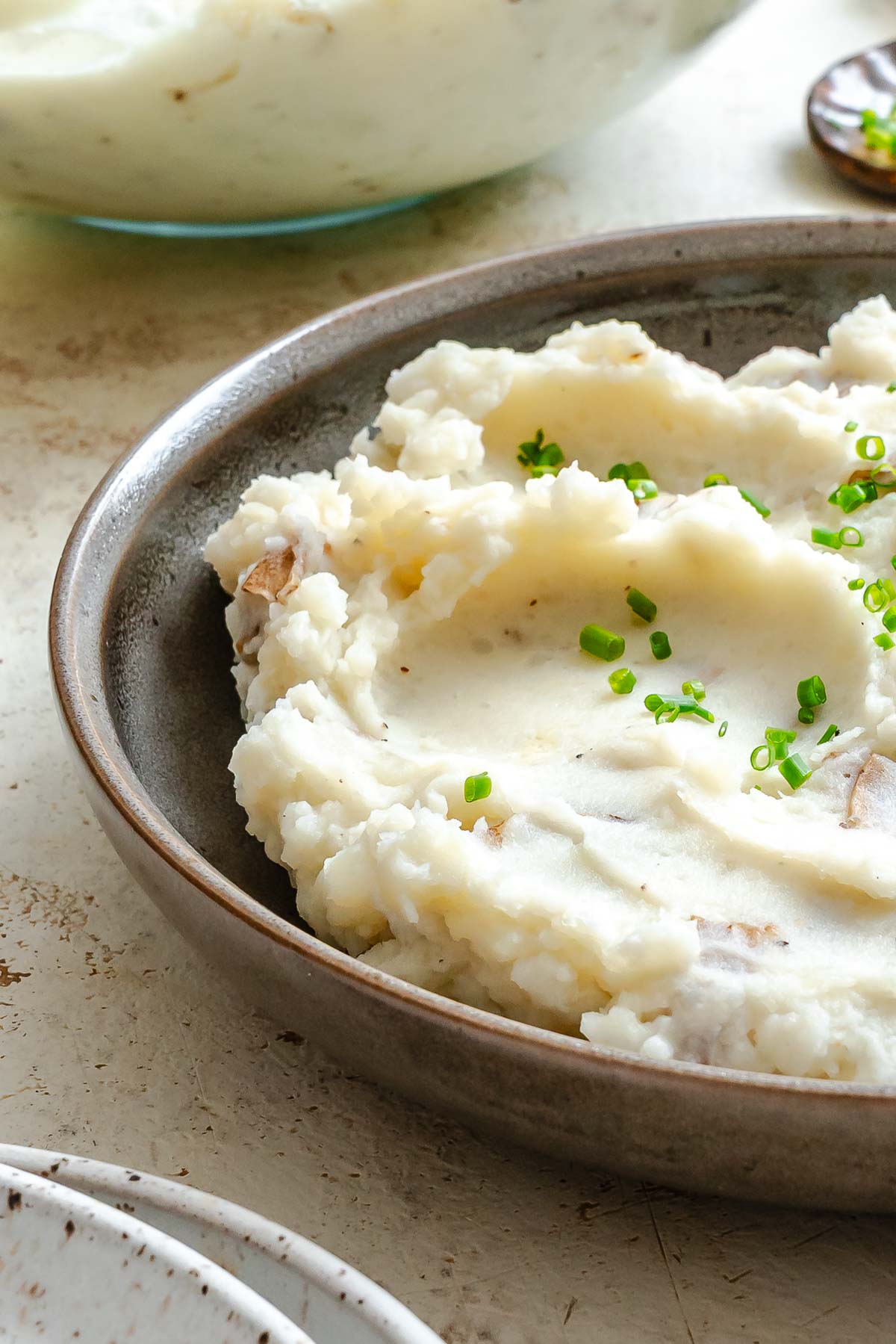 Completed vegan garlic mashed potatoes in a bowl.