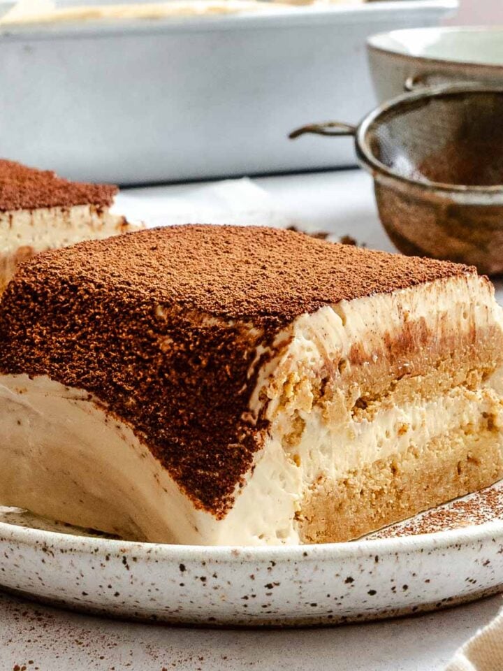 Completed Easy Vegan Tiramisu on a white surface.