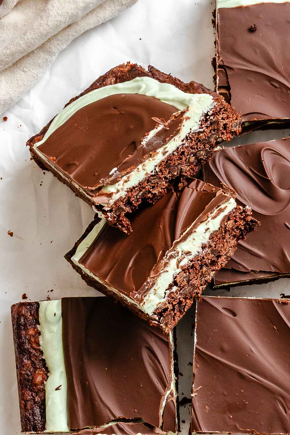 Completed Peppermint Chocolate Brownies on a white surface.