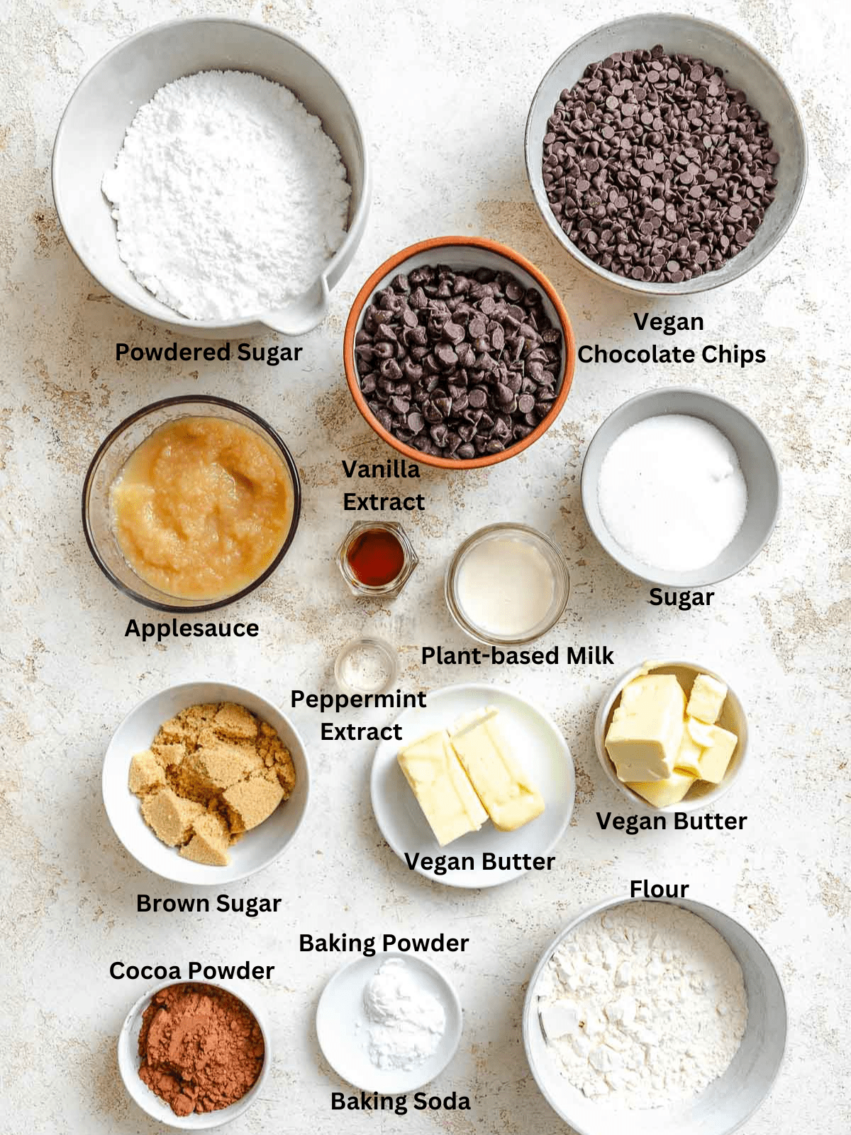 Ingredients for Peppermint Chocolate Brownies measured out on a white surface.