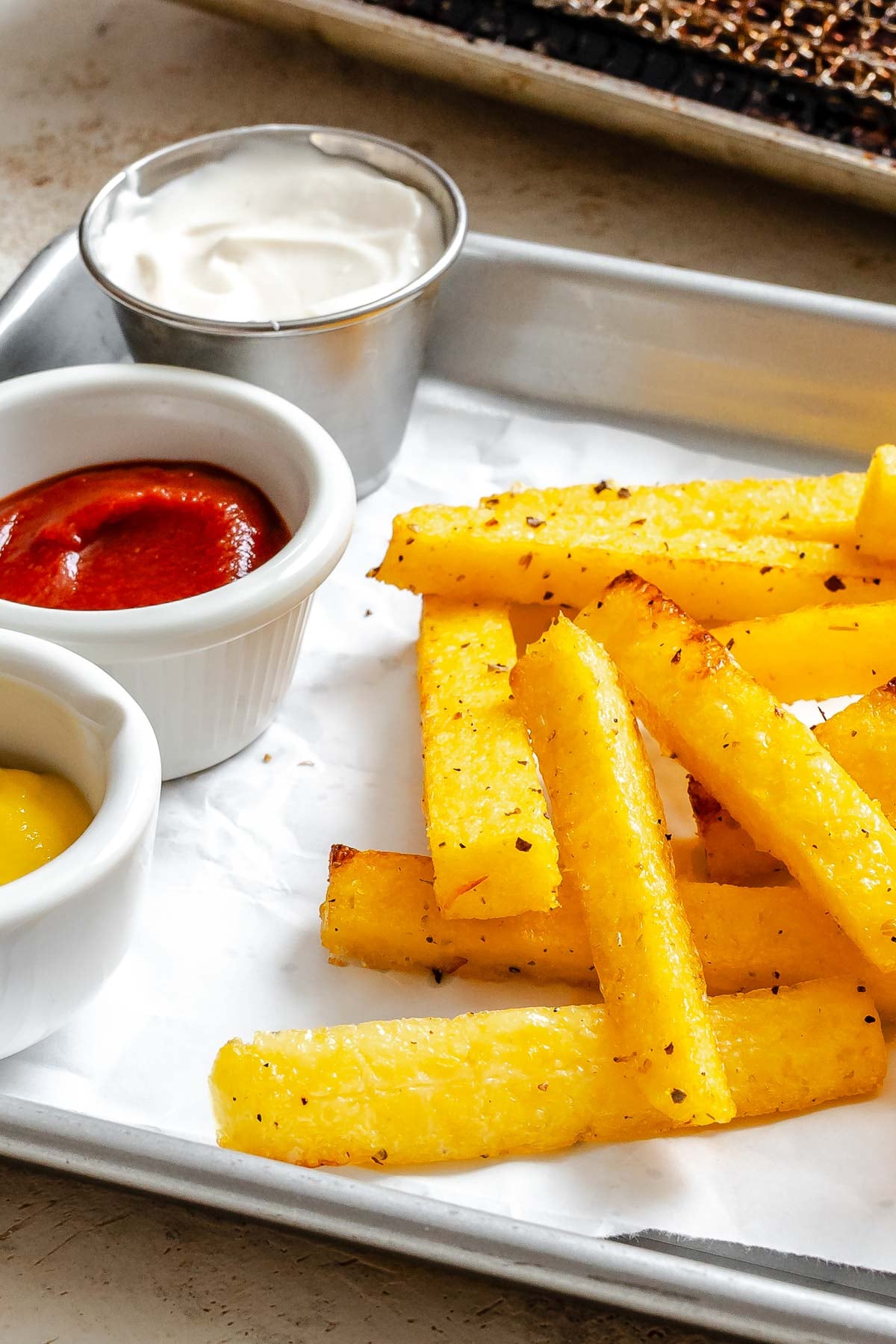 Completed Air Fryer Polenta Fries on tray.
