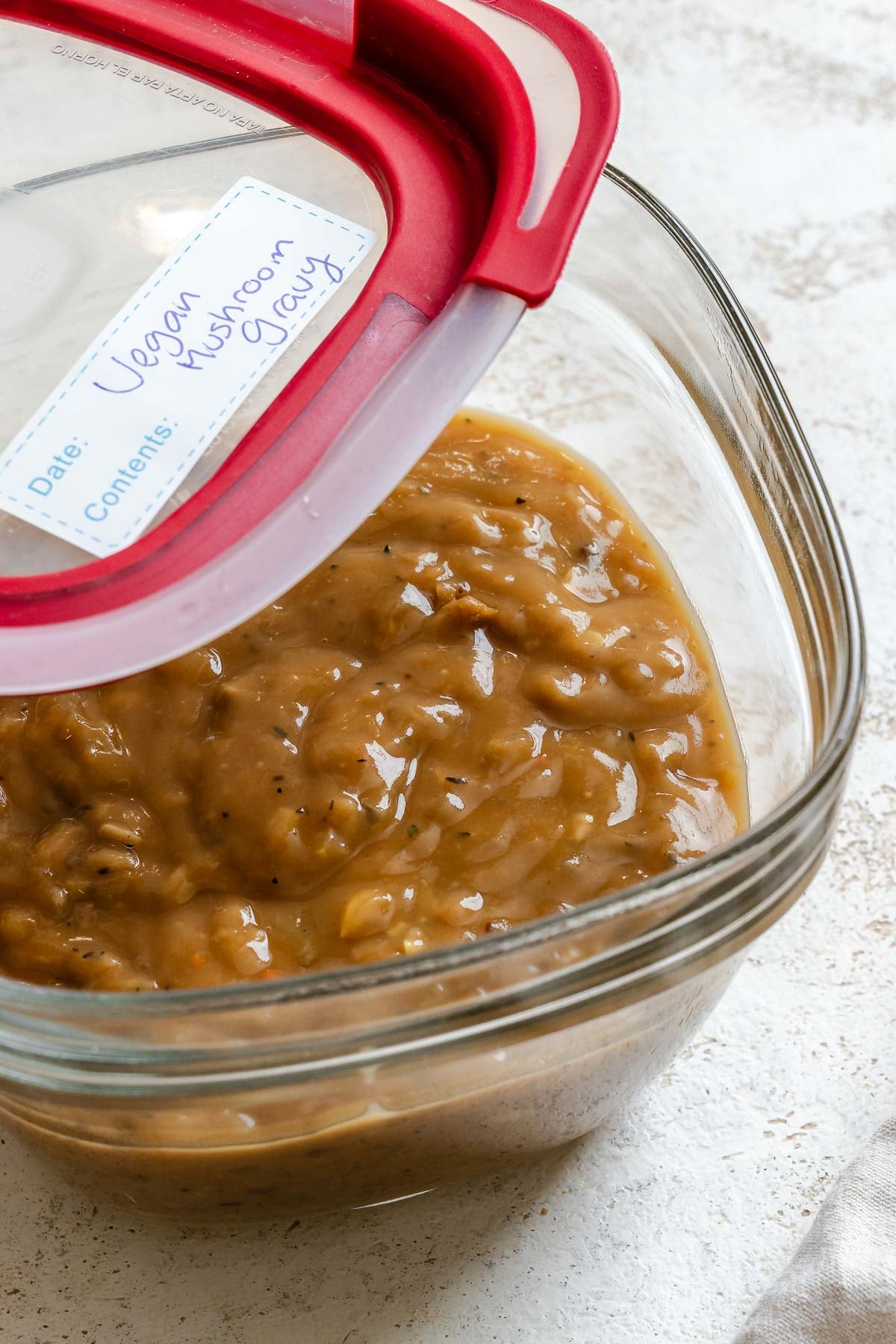 Completed Vegan Mushroom Gravy in a storage container.