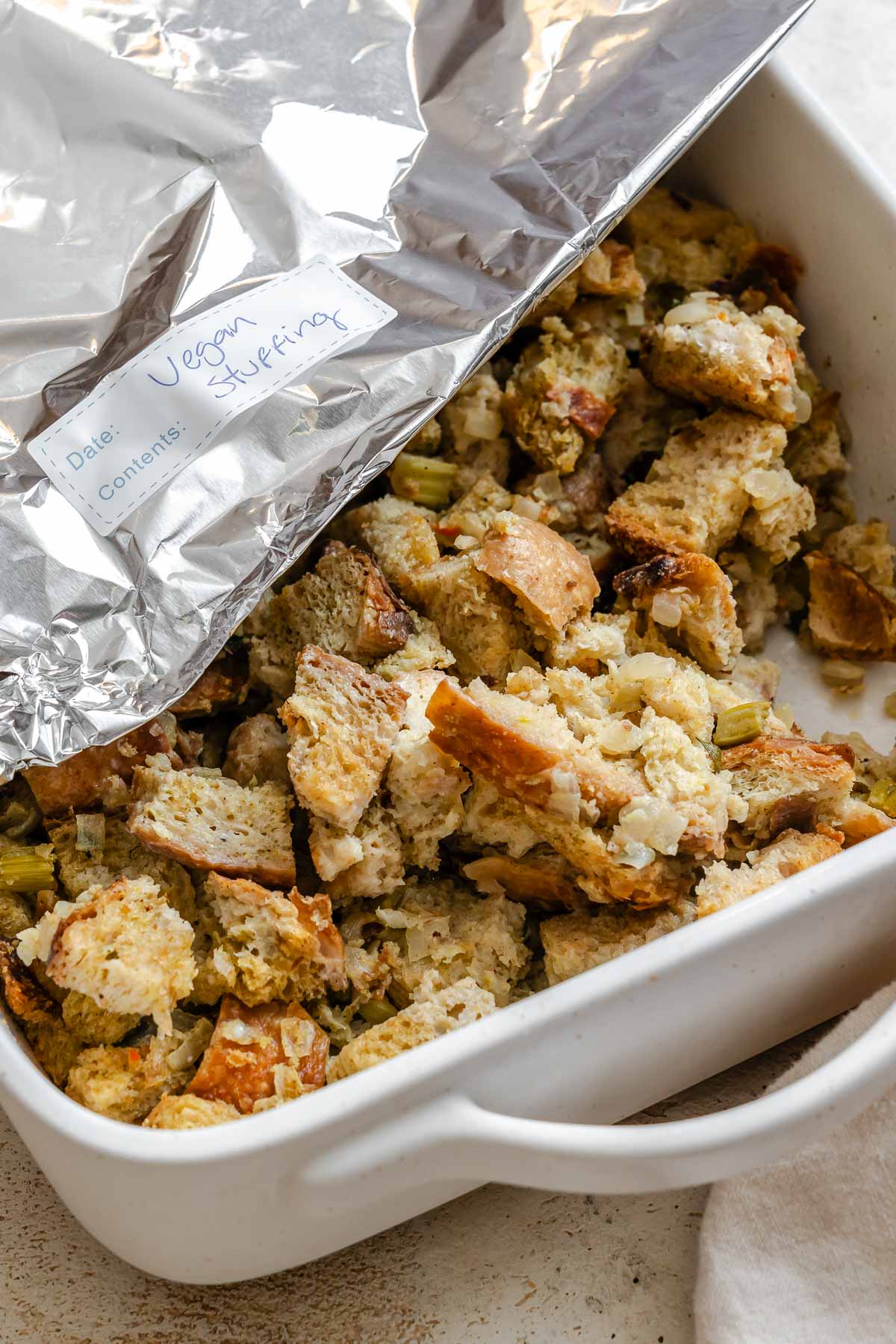 Completed Easy Vegan Stuffing in a storage container.