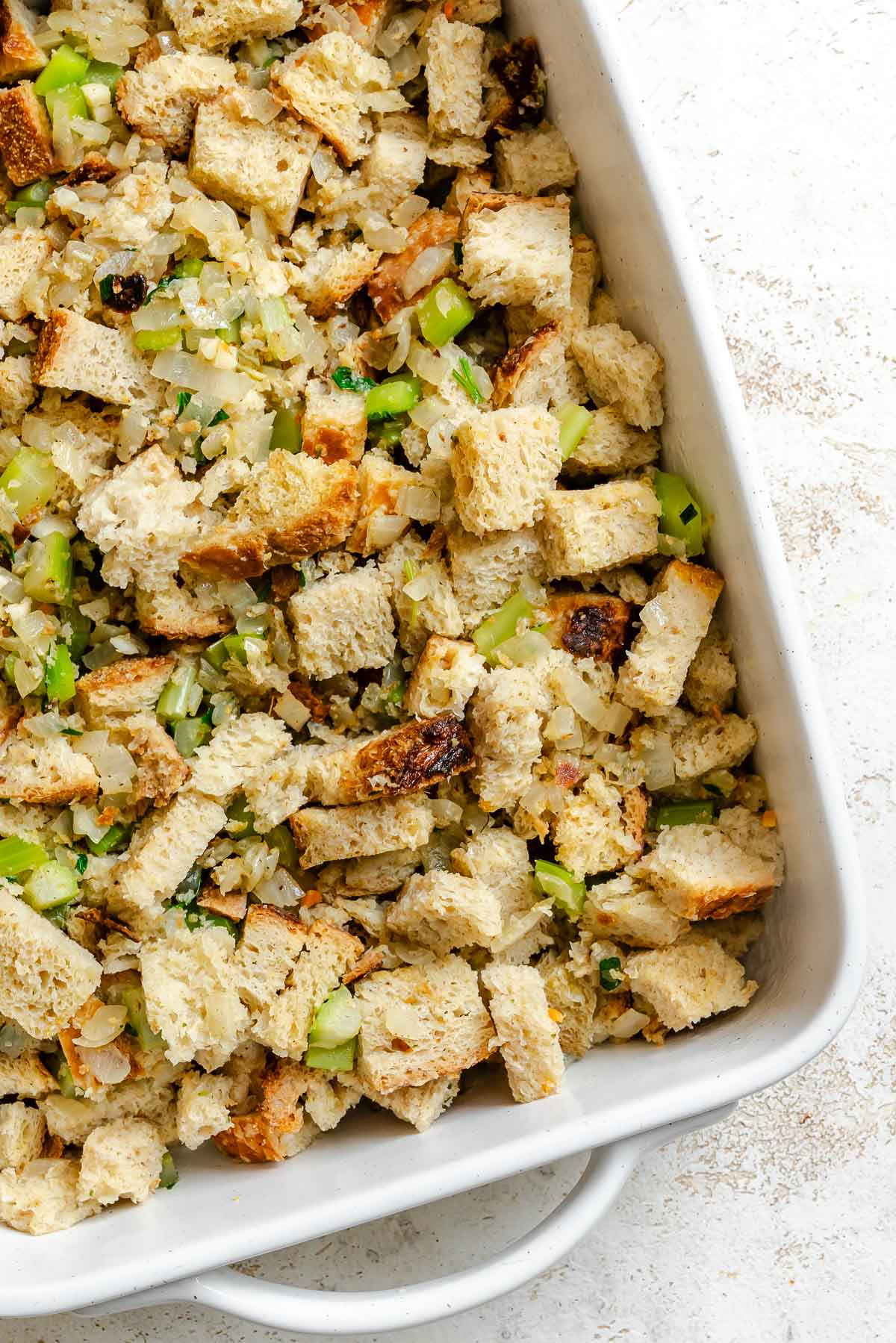 Process shot showing ingredients in a baking dish.