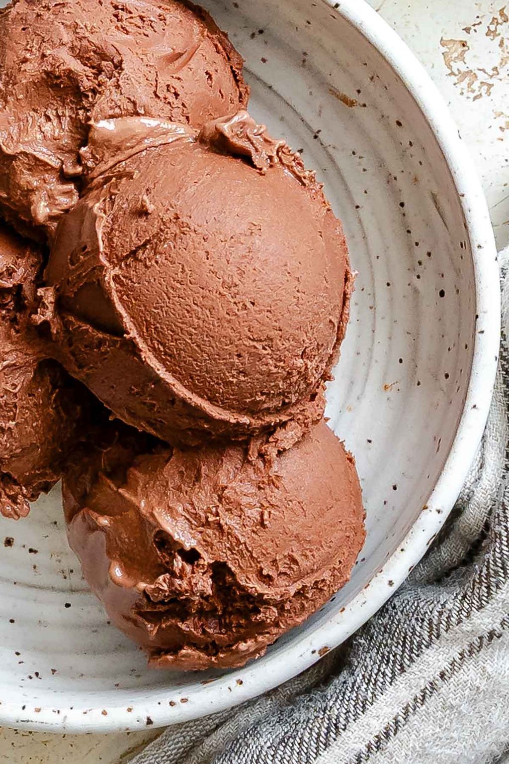 Completed scoops of Vegan Chocolate Ice Cream (Ninja Creami) in a bowl.