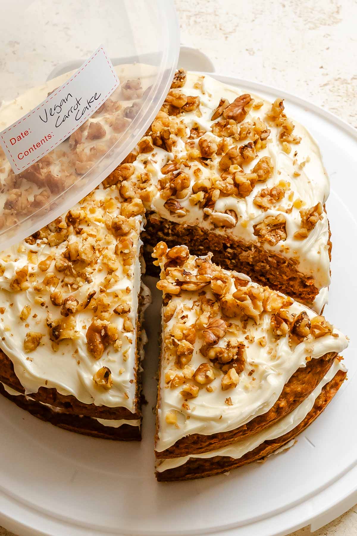 Completed Vegan Carrot Cake in a storage container.