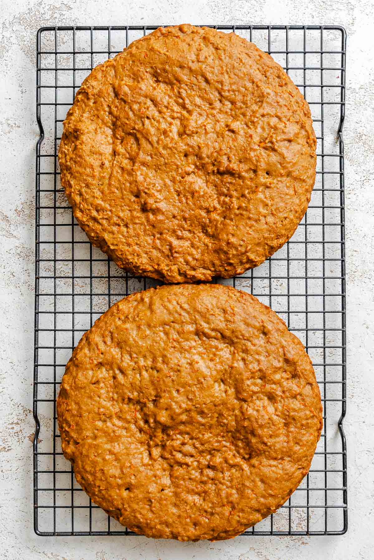 Process shot showing cake cooling on cooling rack.