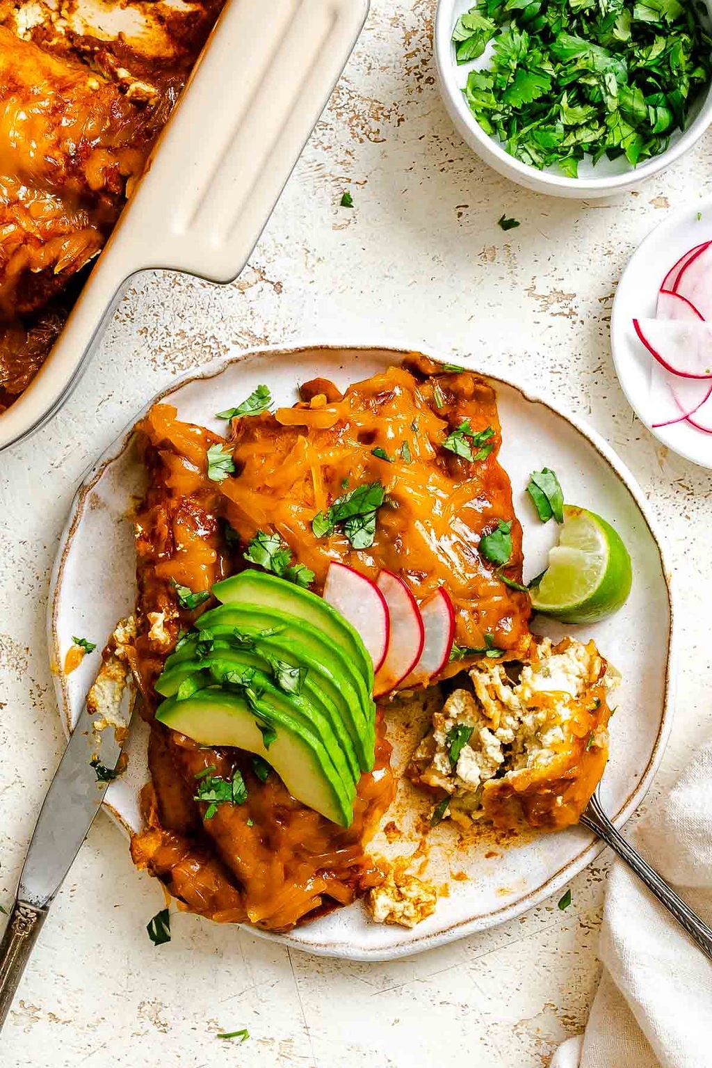 Completed Vegan Cheese Enchiladas on a plate.