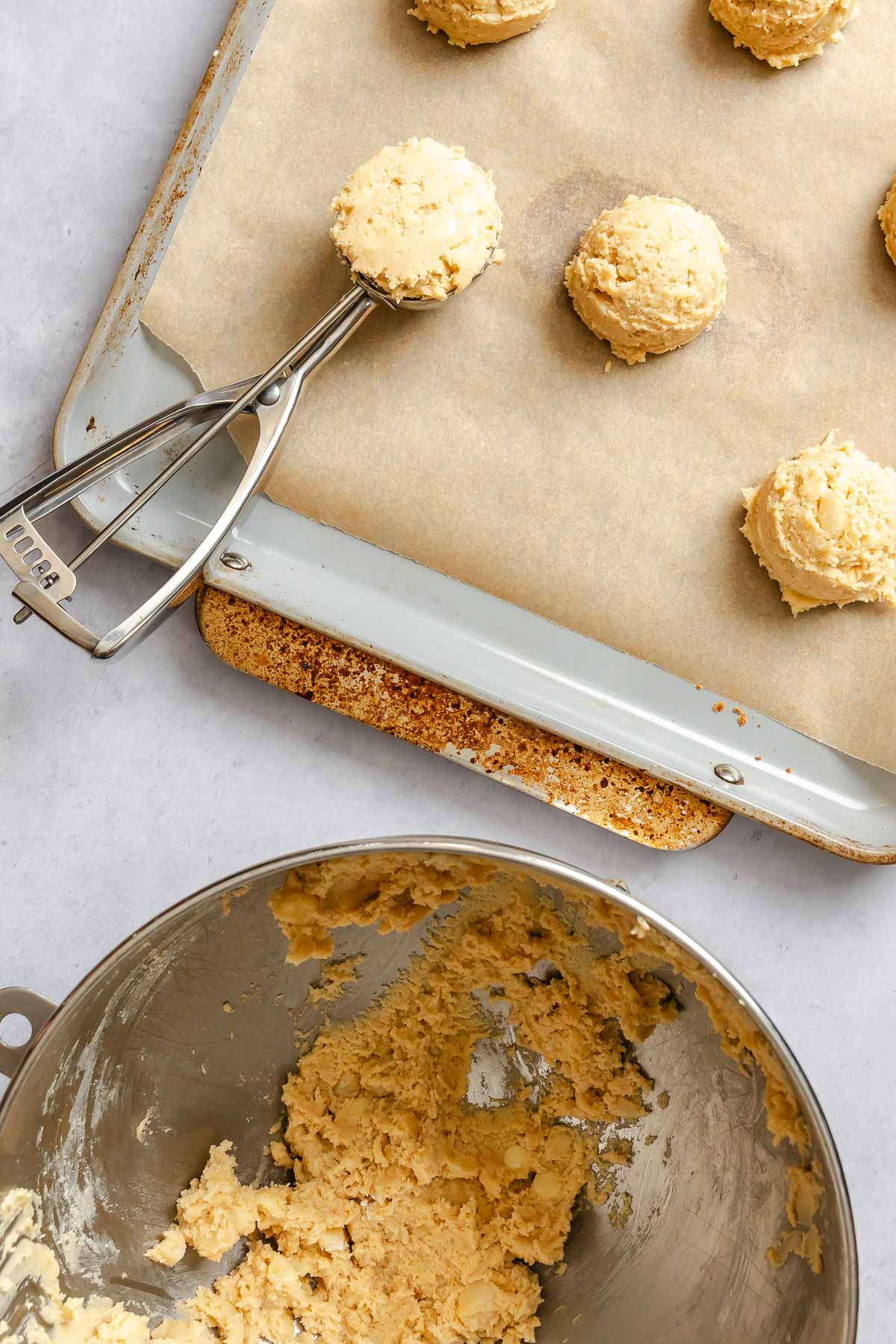 Process shots showing transferring dough onto a baking sheet.