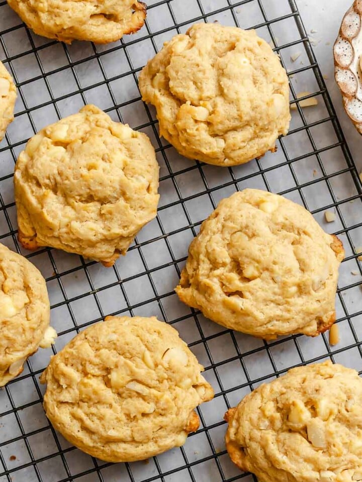 Completed White Chocolate Macadamia Nut Cookies on a wire rack.