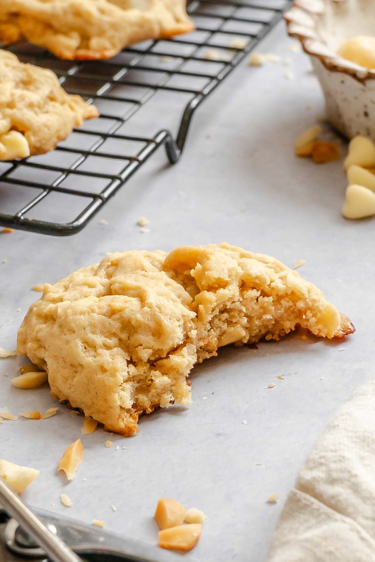 Completed White Chocolate Macadamia Nut Cookies on a wire rack.