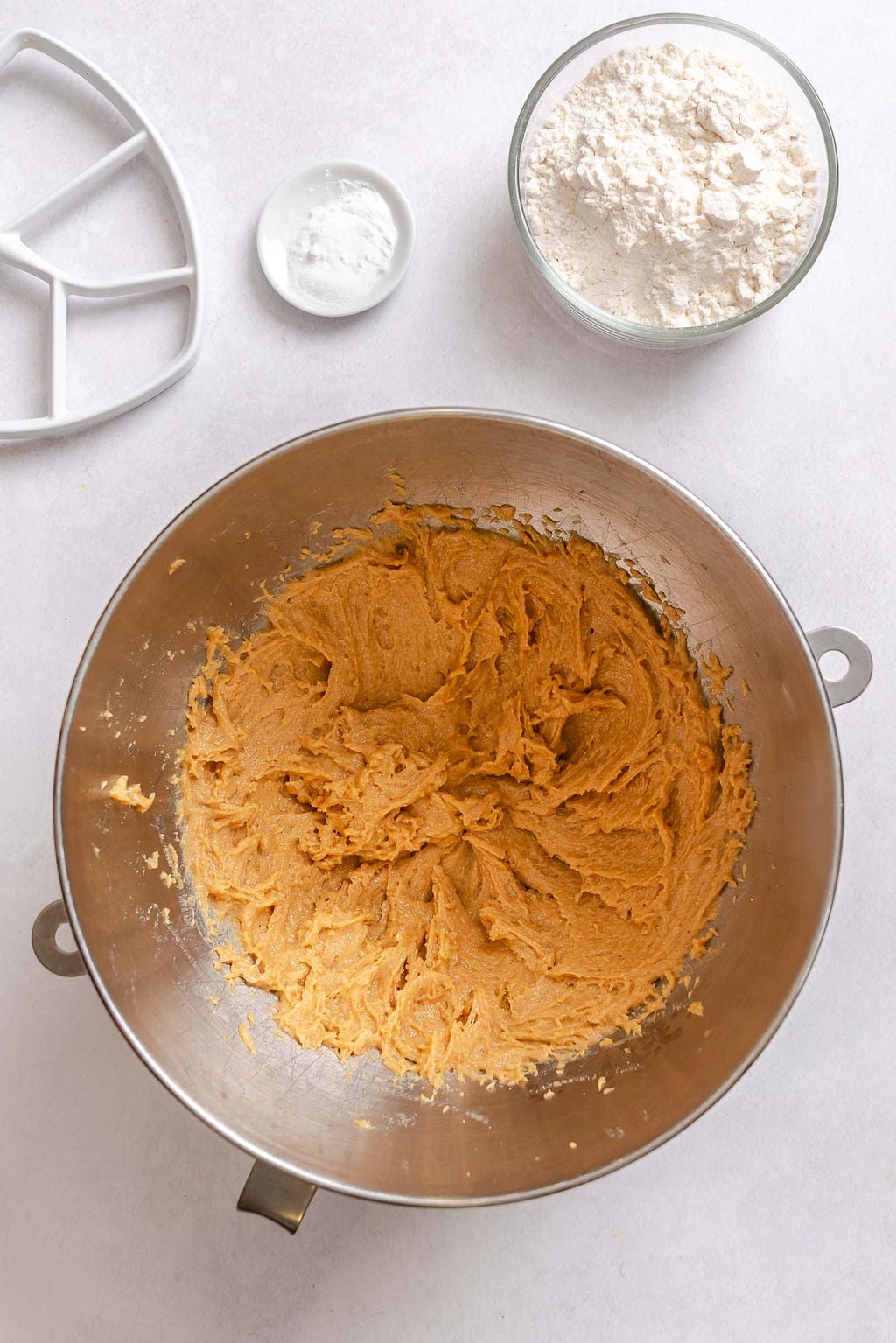 Process shot showing ingredients mixed together in a bowl.