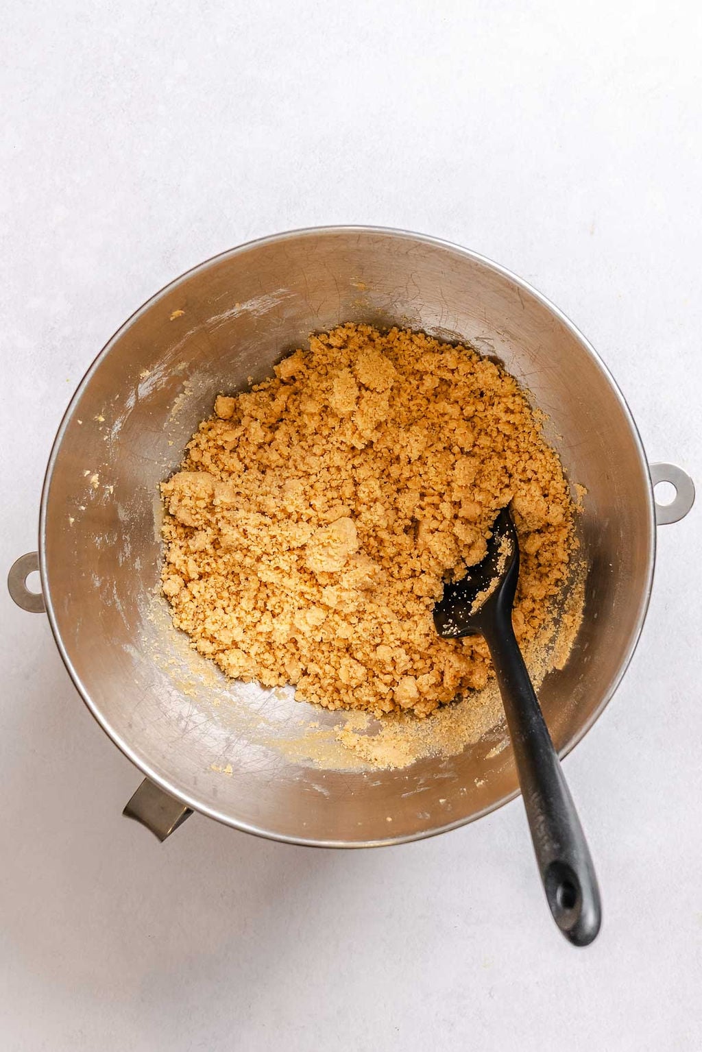 Process shot showing stirring ingredients in a bowl.
