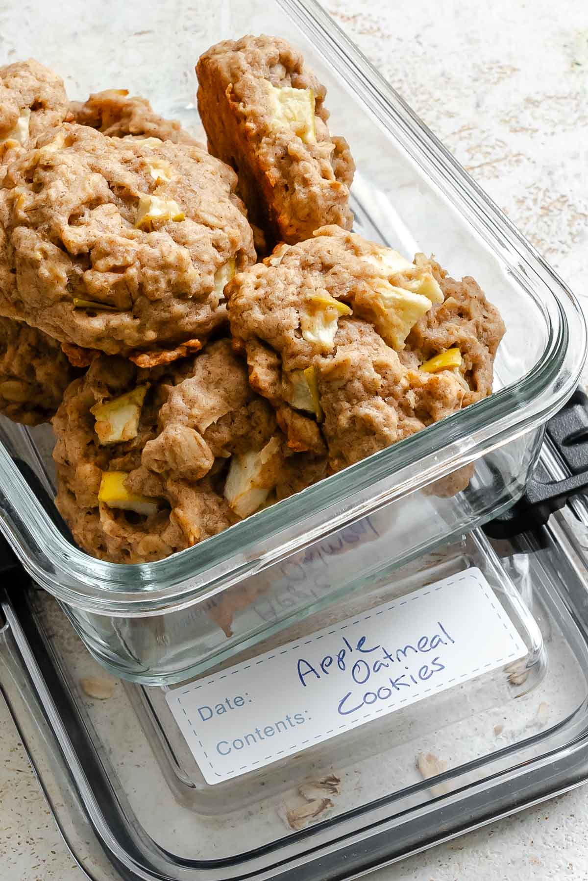 Completed Apple Oatmeal Cookies in storage container.