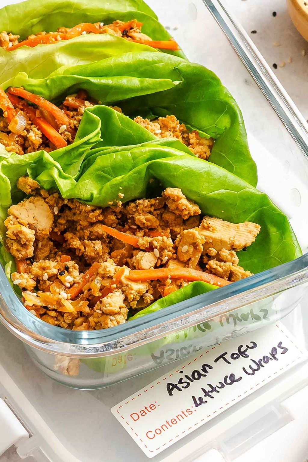 Completed Asian Tofu Lettuce Wraps in a storage container.