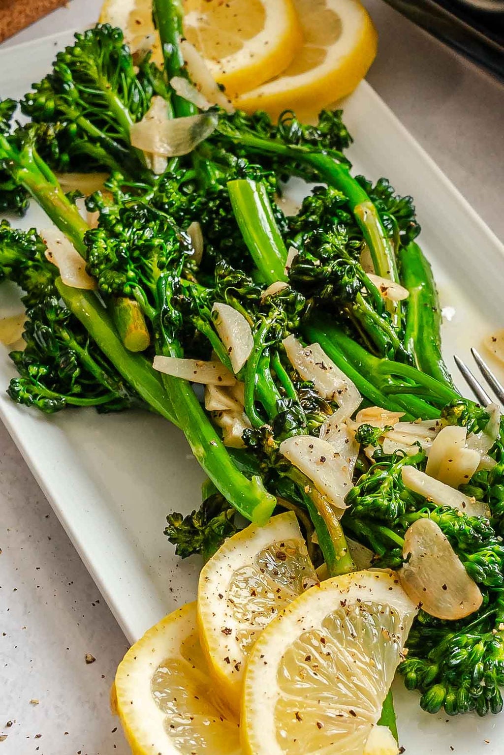 Completed Saut&eacute;ed Broccolini in a baking dish. 
