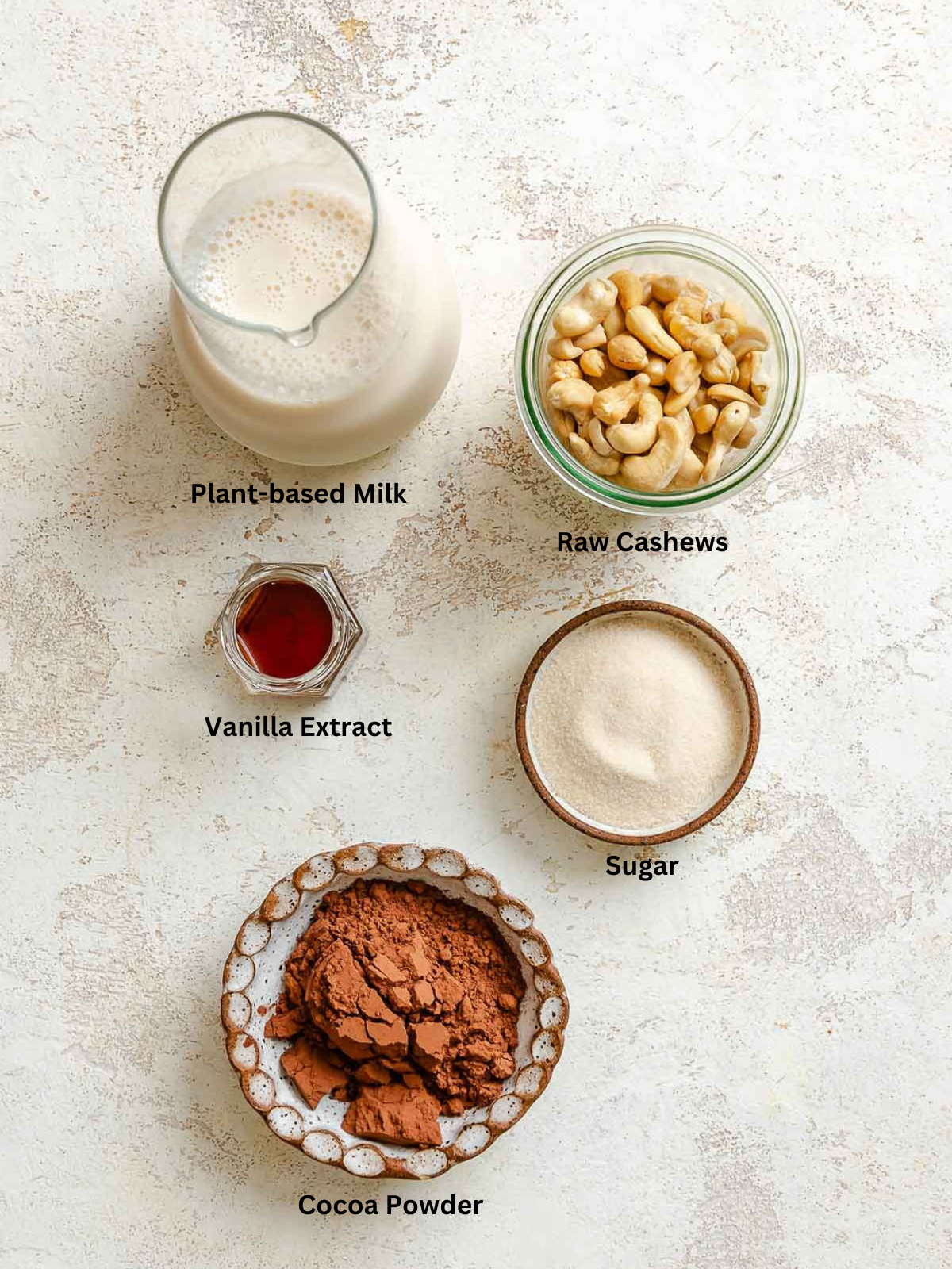 Ingredients for Vegan Chocolate Ice Cream (Ninja Creami) measured out on a white surface.
