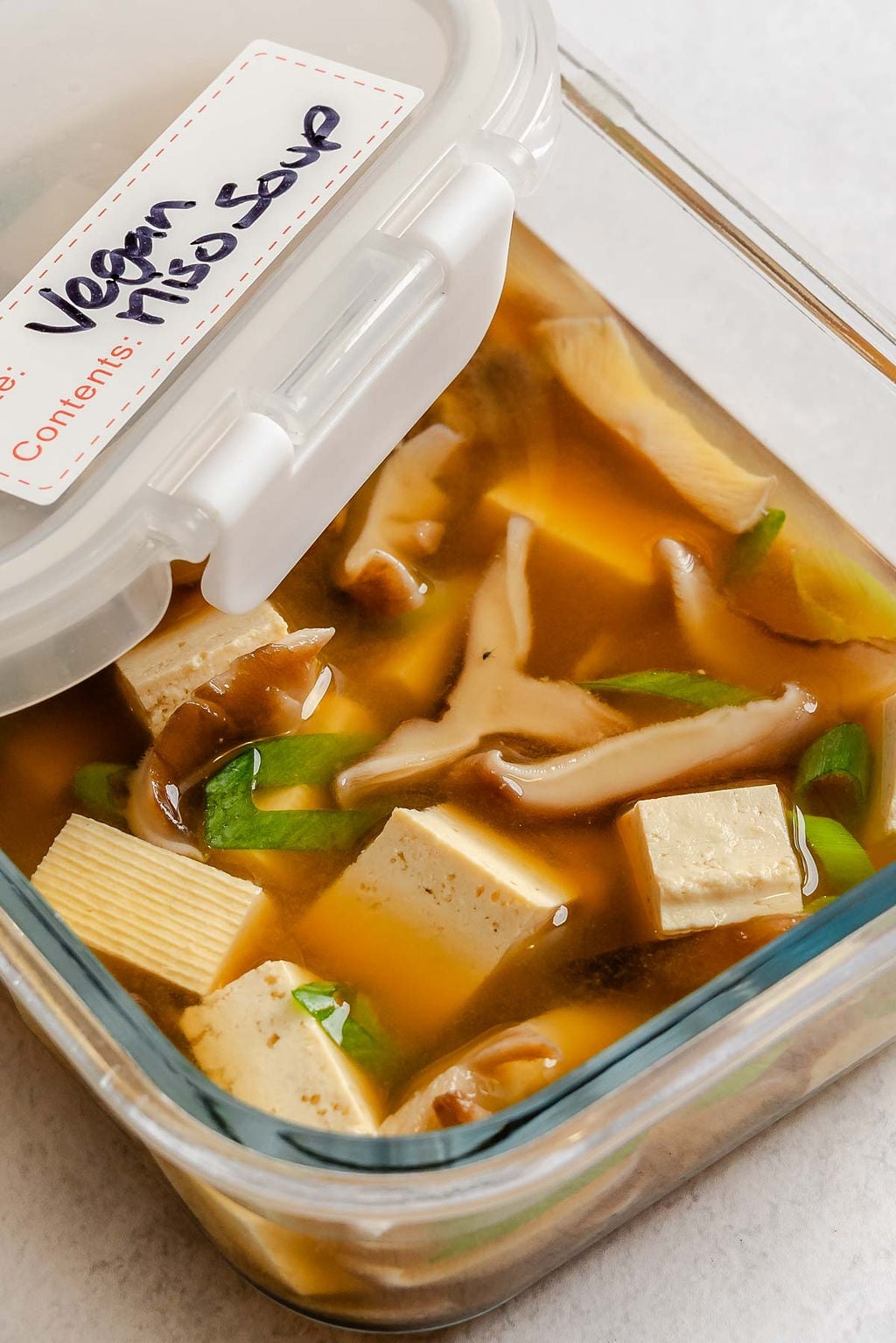 Completed Vegan Miso Soup in a storage container.