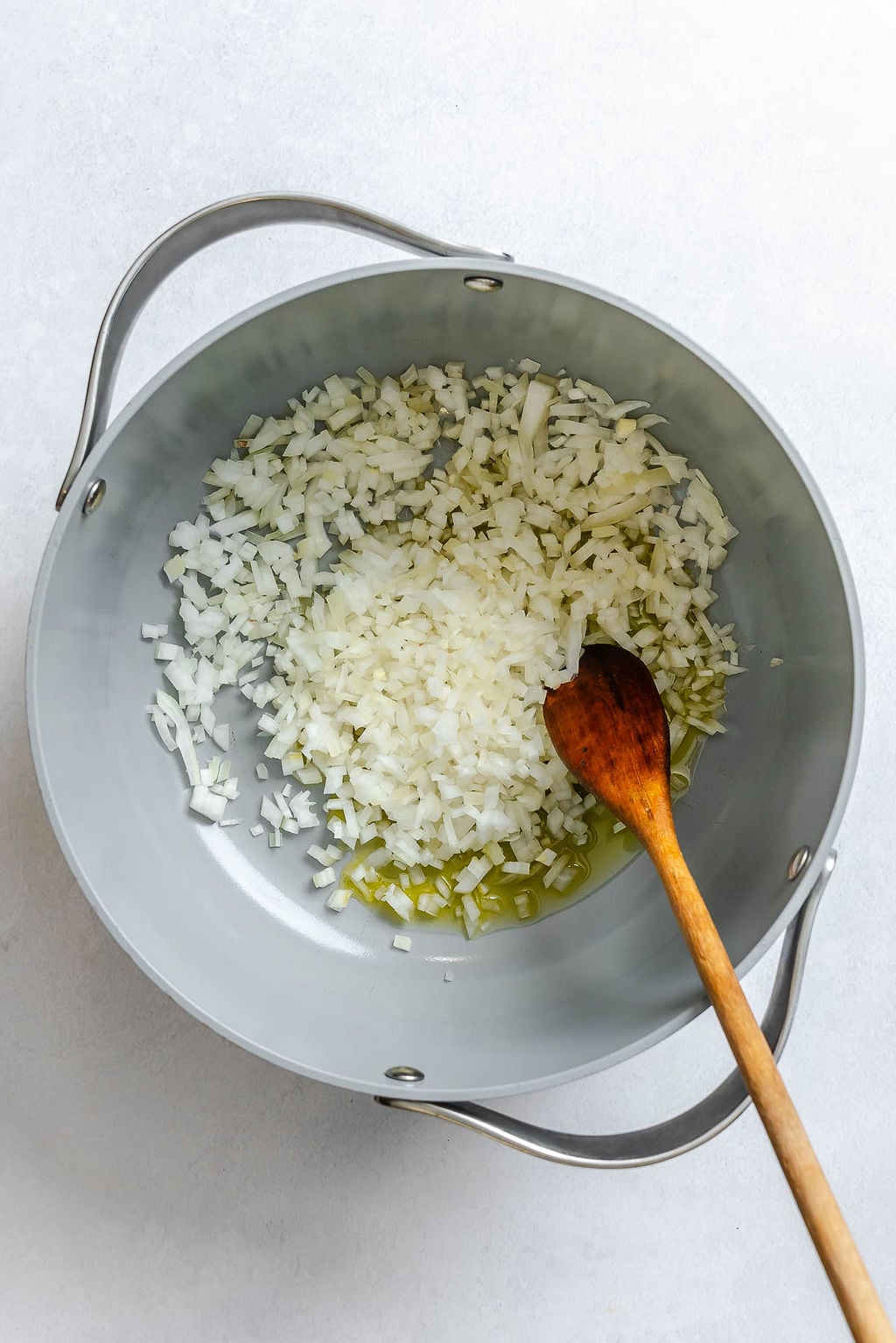 Process shot showing stirring ingredients in a bowl.