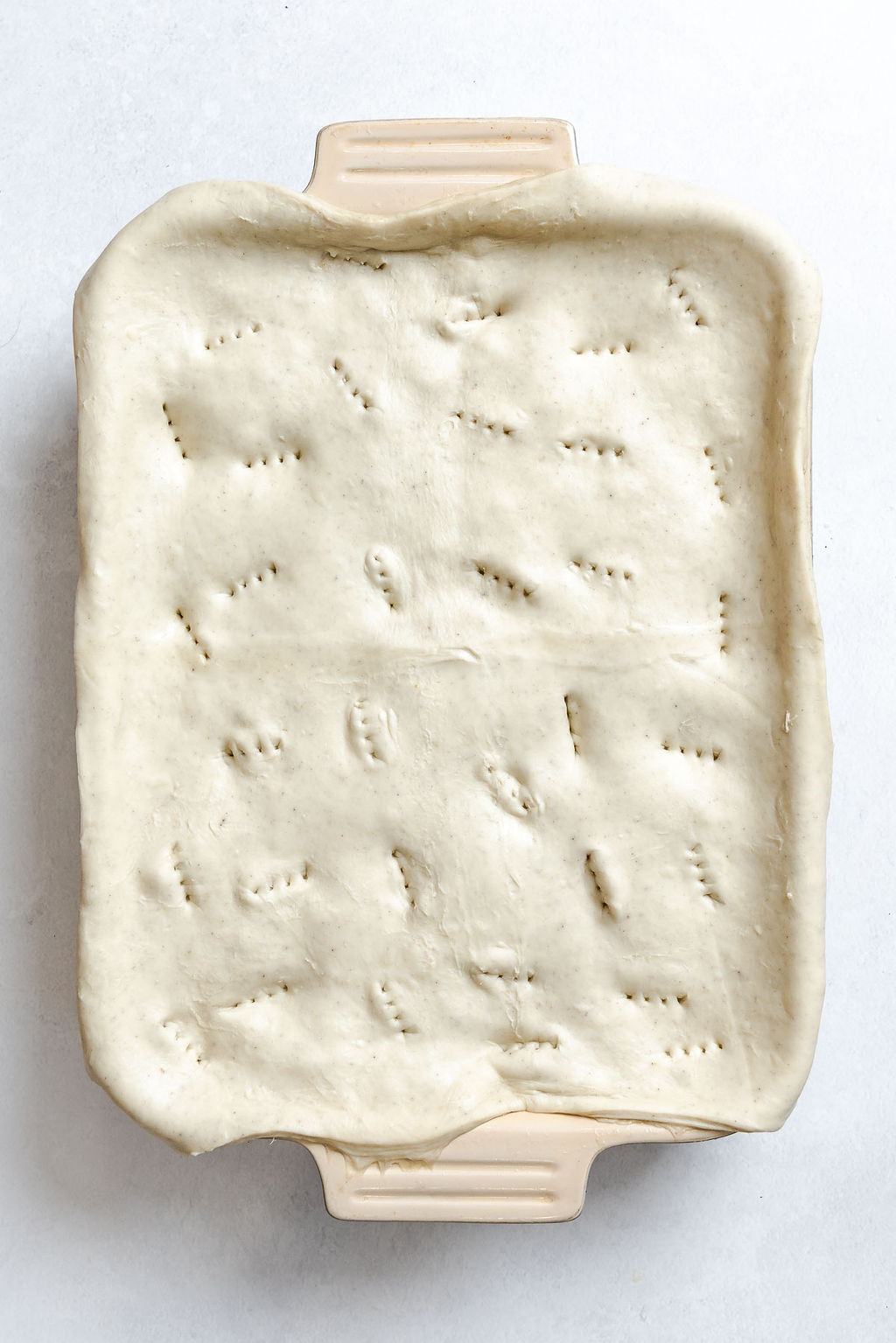 Process shot showing pre-baked Vegan Chicken Pot Pie (Casserole) in baking dish.