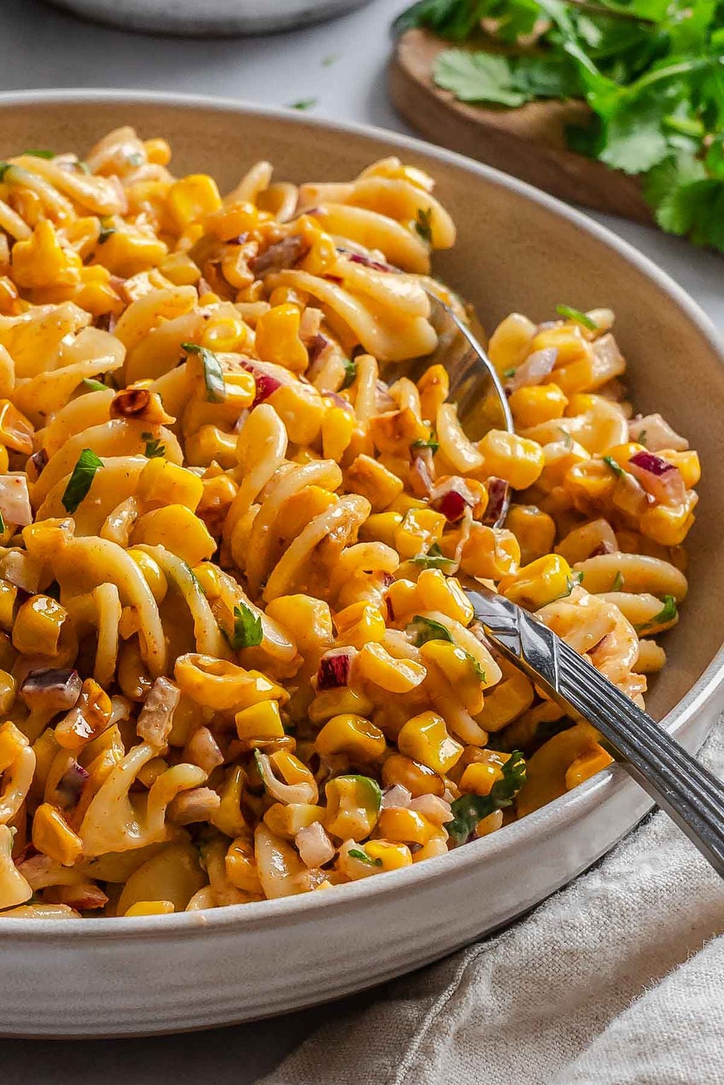 Completed Elote Pasta Salad (Mexican Street Corn) on a plate.