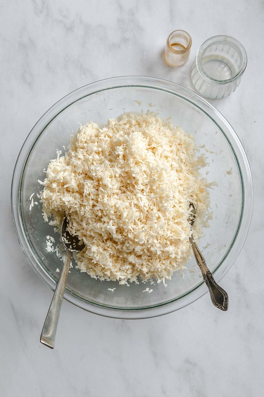 Process shot showing mixing ingredients in a bowl.