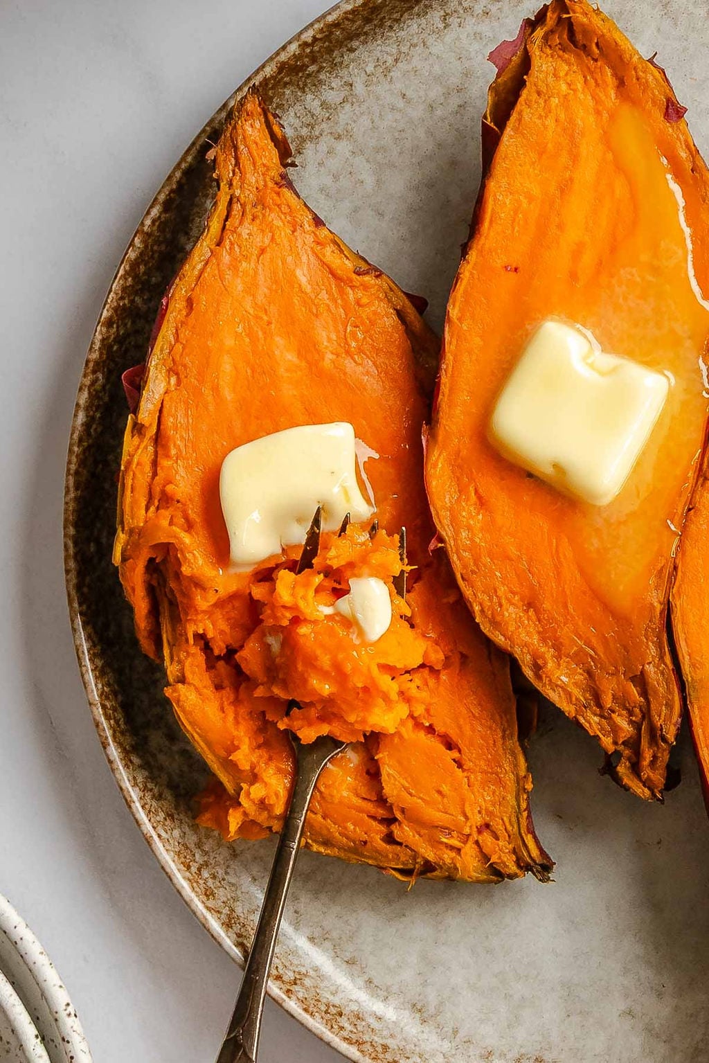 Completed Instant Pot Sweet Potatoes on a plate.