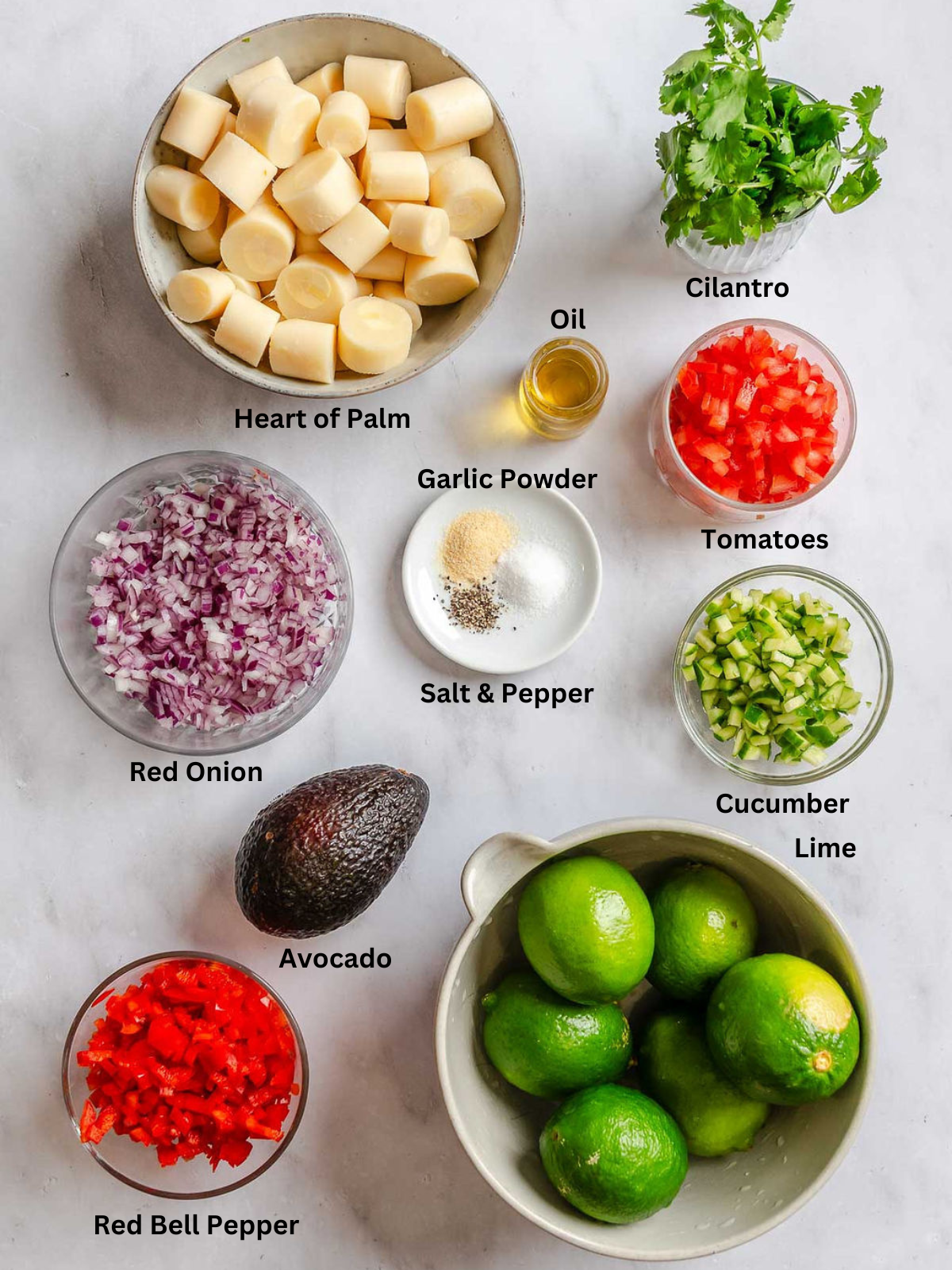 Ingredients for Vegan Ceviche (Heart of Palm) measured out on a white surface.