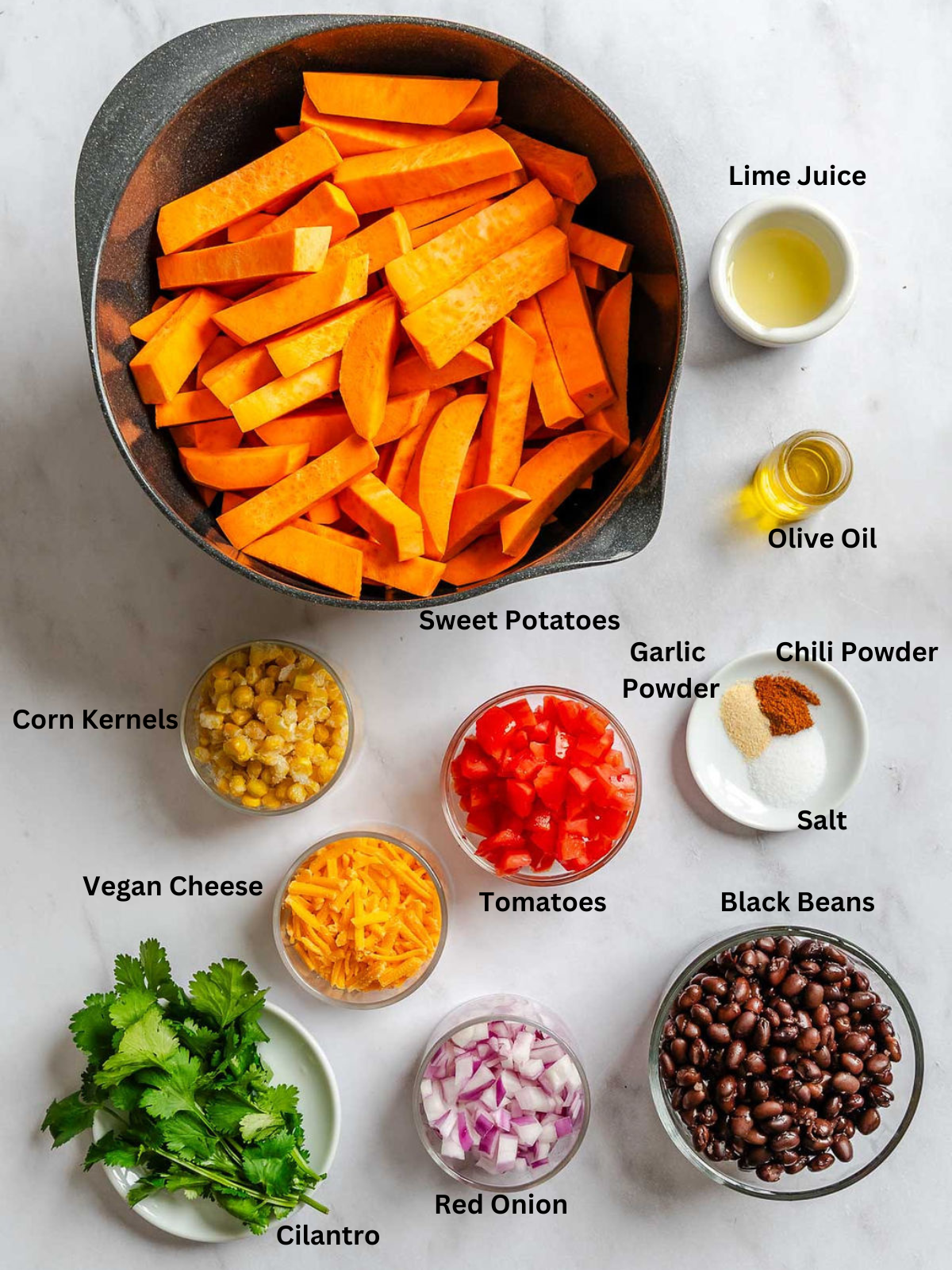 Ingredients for Loaded Sweet Potato Fries measured out on a white surface.