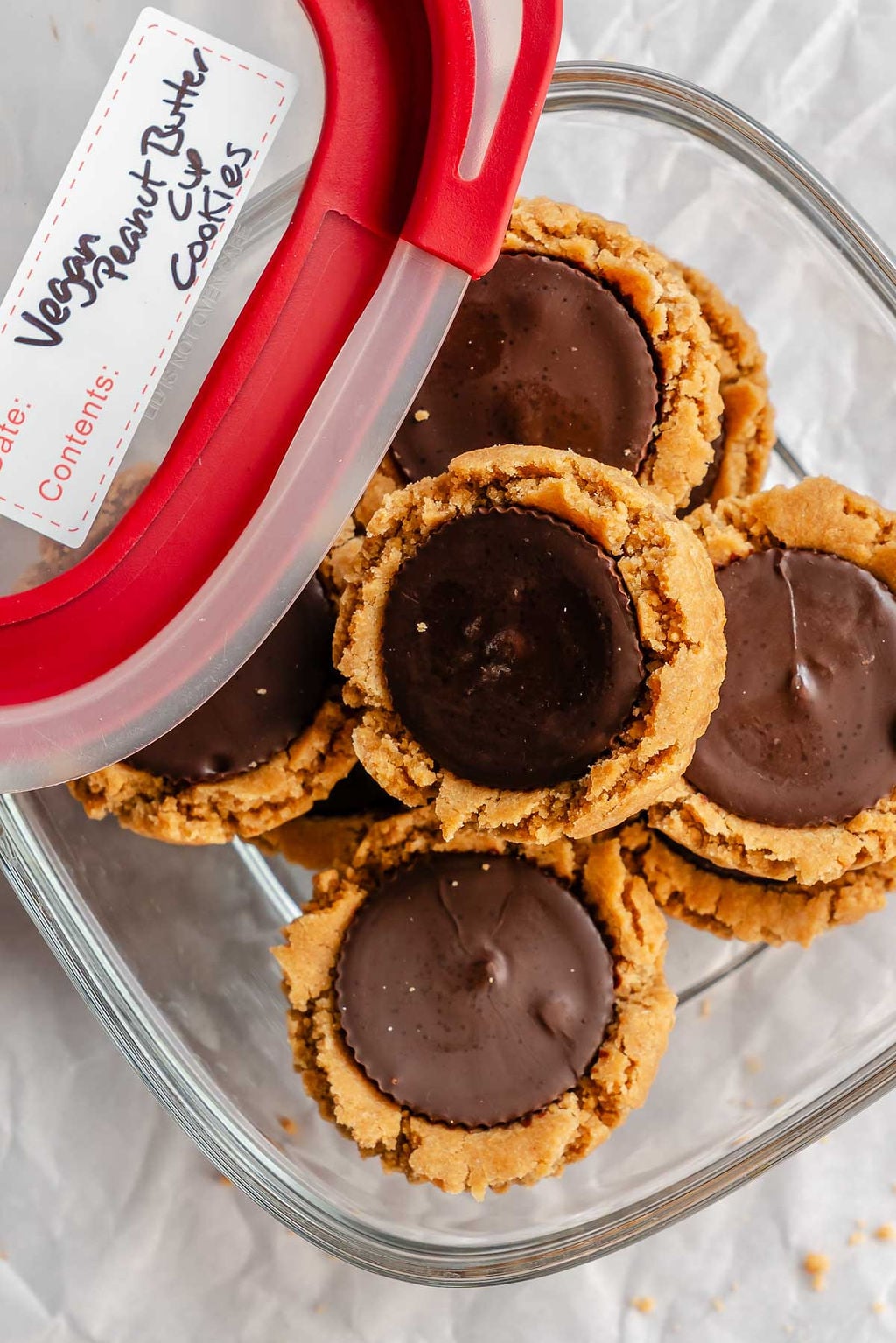 Completed Peanut Butter Cup Cookies in a storage container.