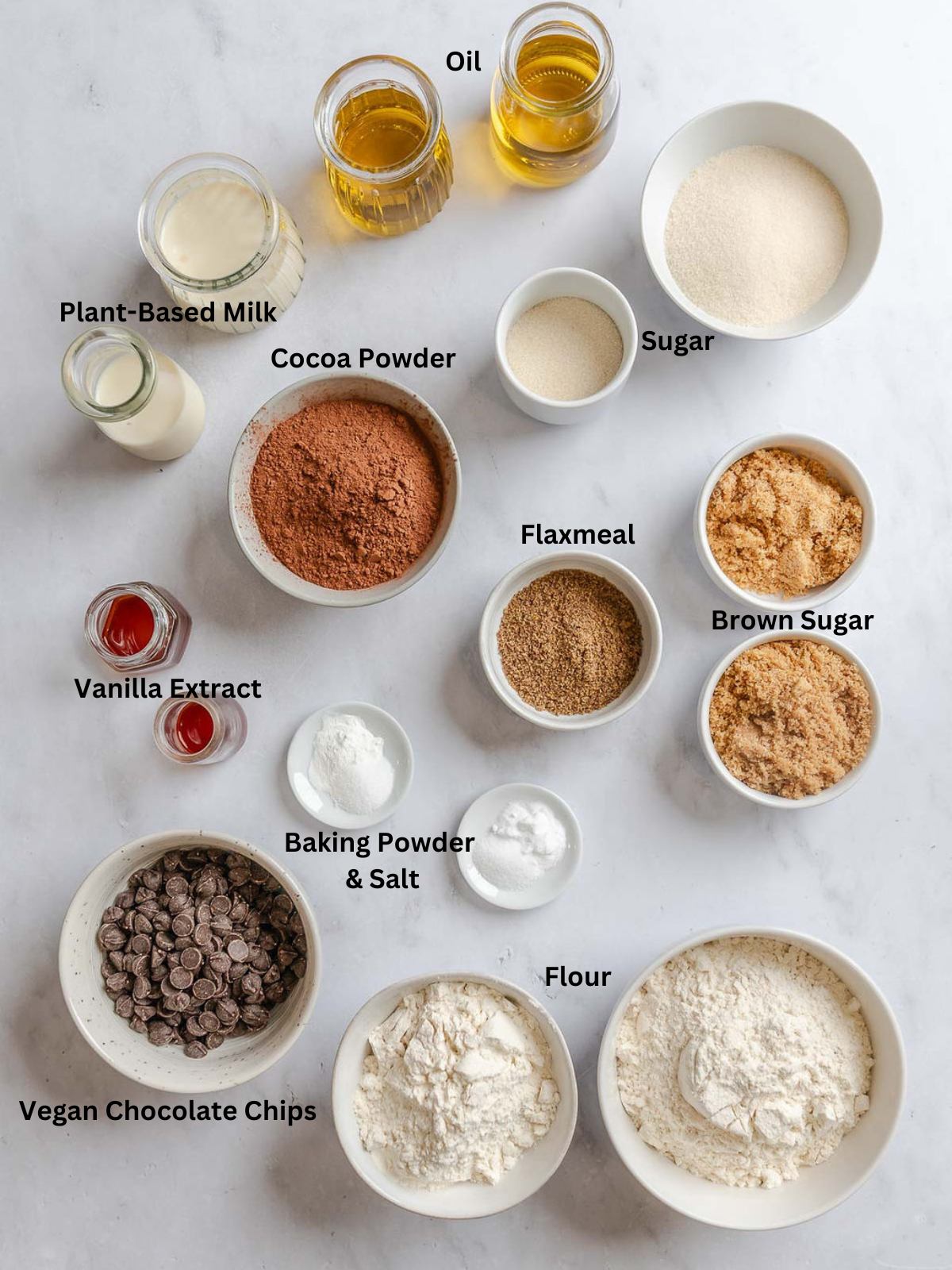 Ingredients for Vegan Brookies measured out on a white surface.