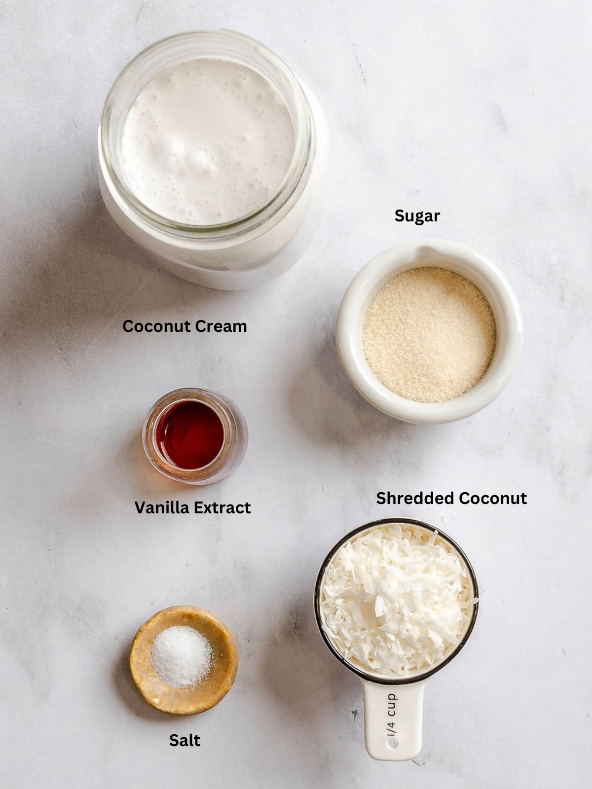 Ingredients for Ninja Creami Coconut Ice Cream measured out on a white surface.